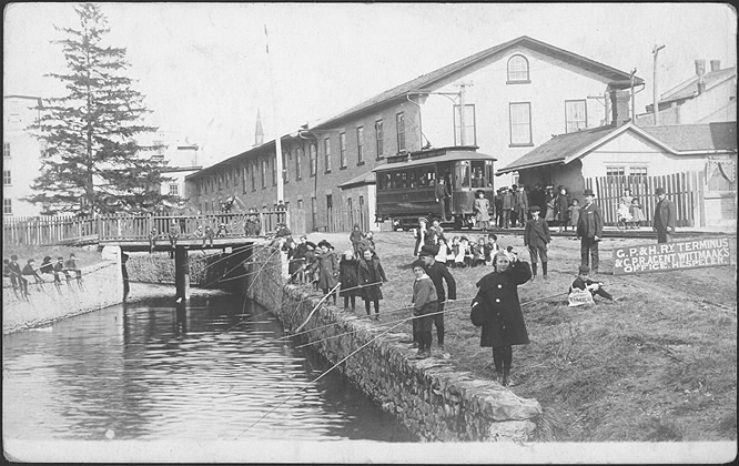 Galt: kids fishing in Hespeler, Ontario, next to a streetcar stop