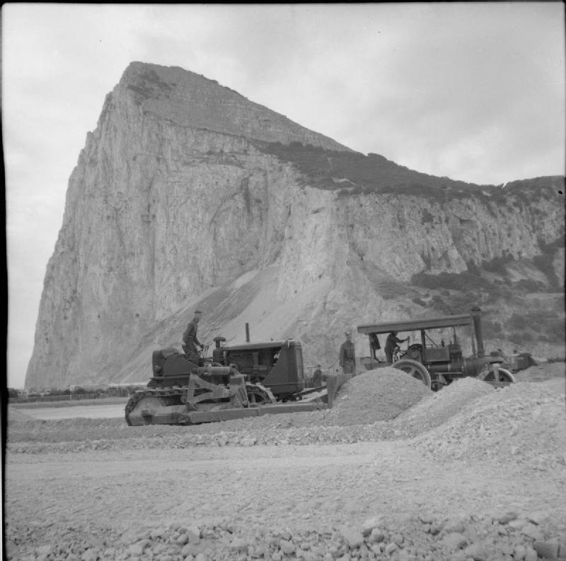 Gibraltar Bulldozer and steamroller during the construction of Gibraltar Airport, 1941